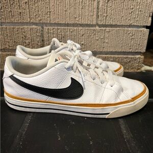 Nike White Leather Low-Top Sneakers with Black Swoosh